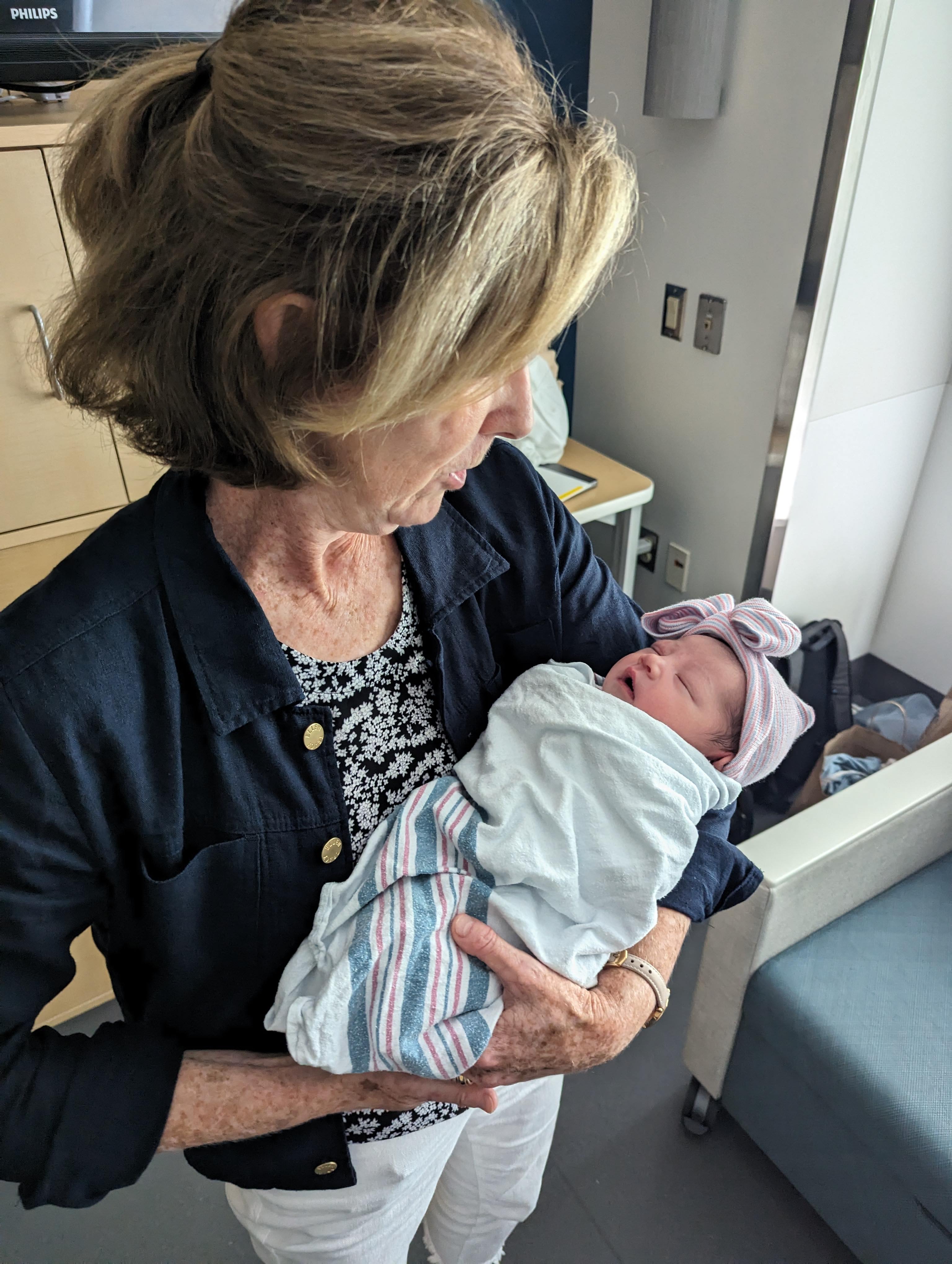 Grammy holding ellie for the first time